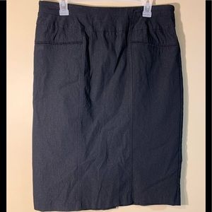 Short black skirt with stretch. Size 14